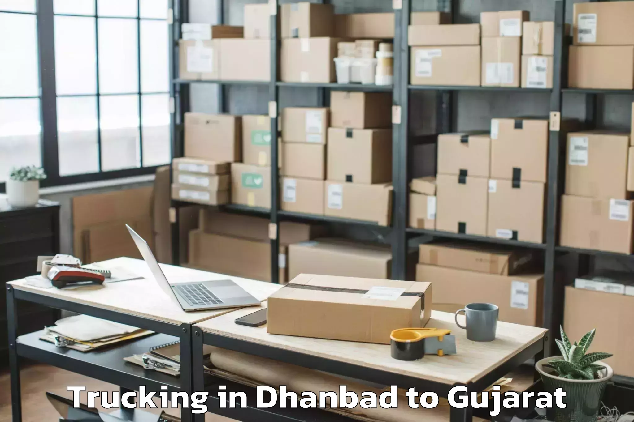 Affordable Dhanbad to Pardi Trucking